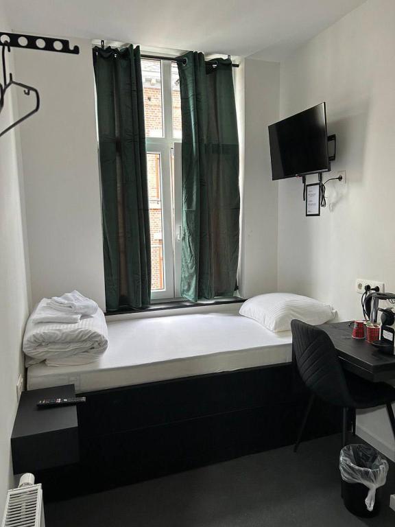 Postel nebo postele na pokoji v ubytování BED Pepin