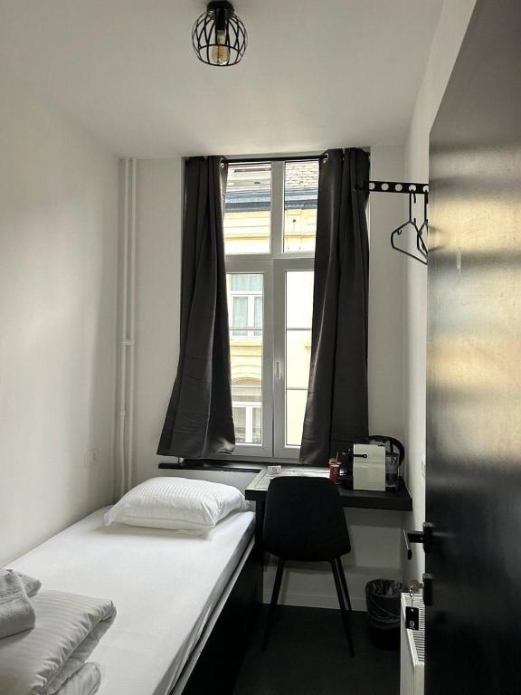 Postel nebo postele na pokoji v ubytování BED Pepin