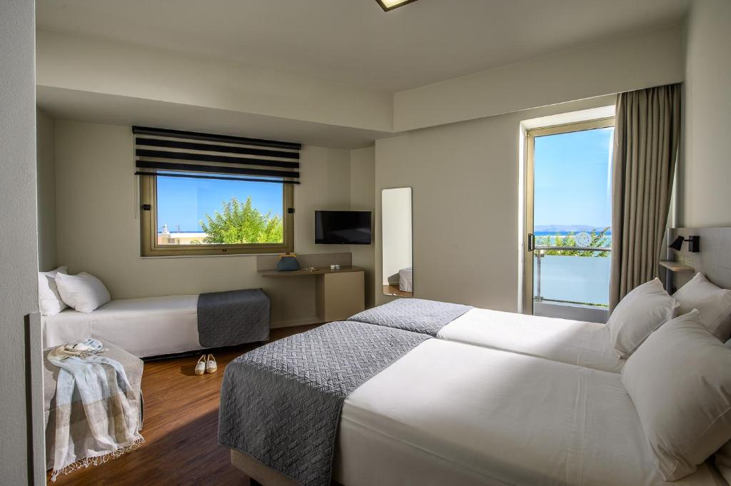 Postel nebo postele na pokoji v ubytování Marin Hotel