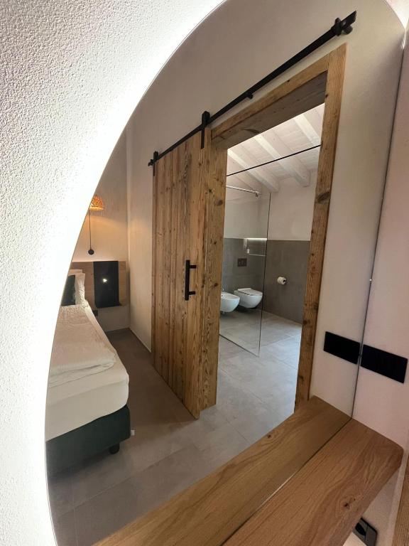 Postel nebo postele na pokoji v ubytování Stella D'Oro - Hotel & Apartments