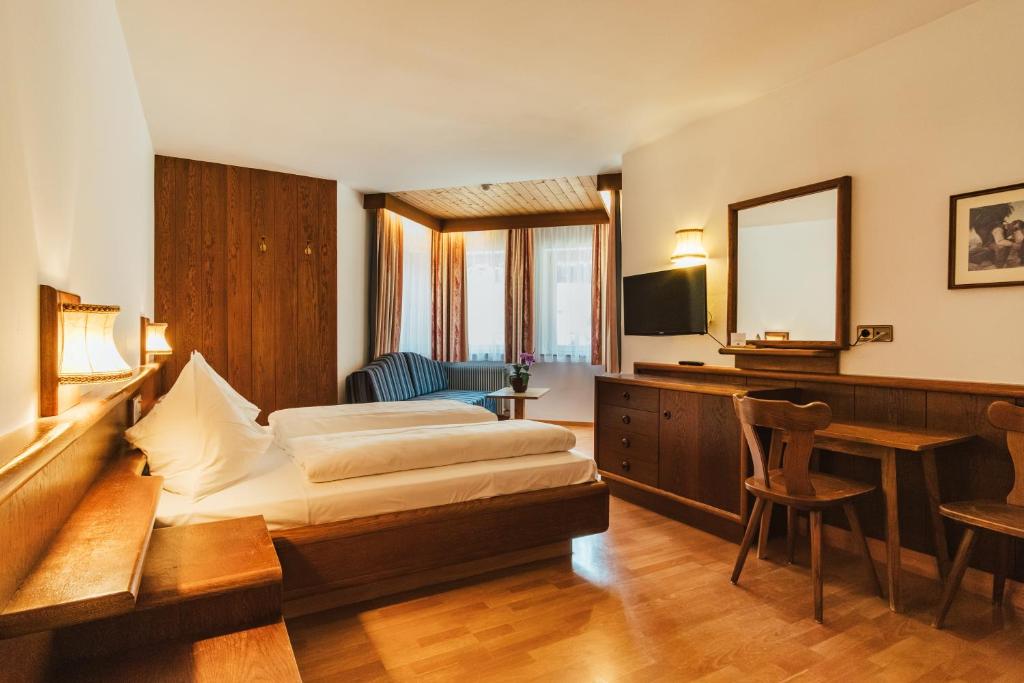 Postel nebo postele na pokoji v ubytování Hotel Residence Griesfeld