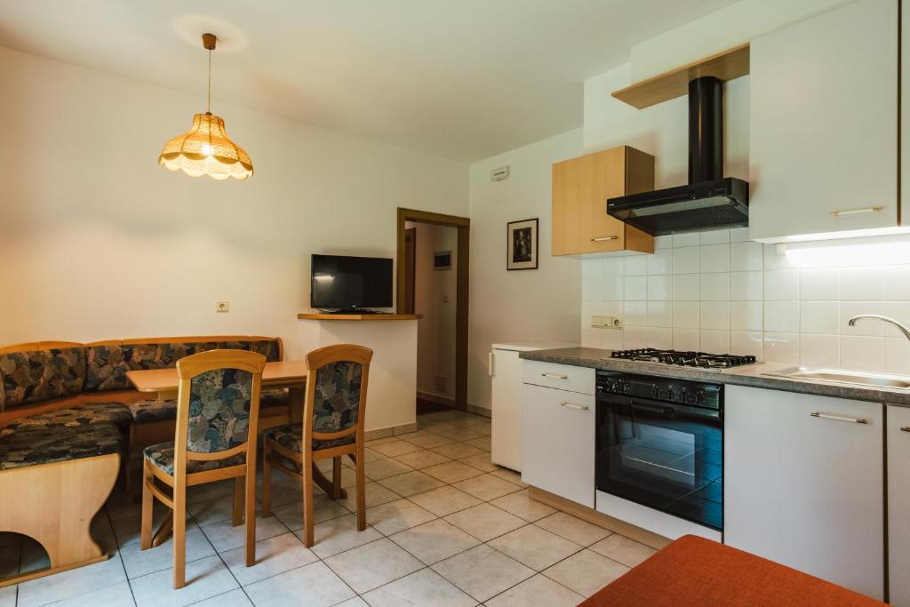 Kuchyň nebo kuchyňský kout v ubytování Hotel Residence Griesfeld