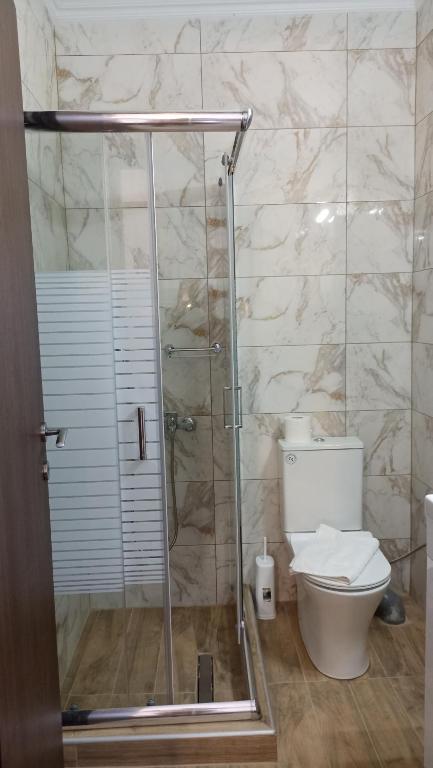 Koupelna v ubytování Villa Karapataki