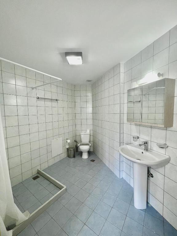 Koupelna v ubytování Melissa Hotel
