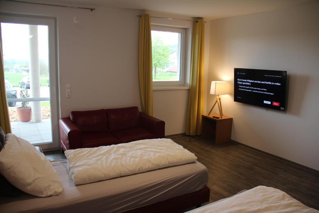 TV a/nebo společenská místnost v ubytování Workers Appartements Kreuzwirt