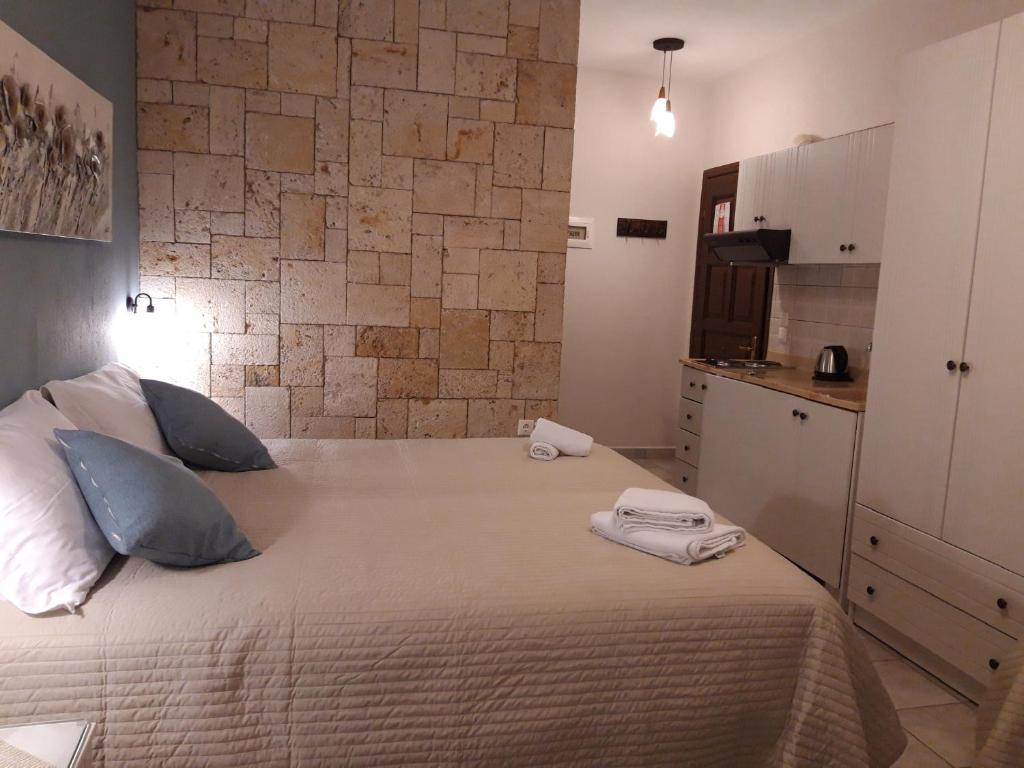 Postel nebo postele na pokoji v ubytování Pansion Irini