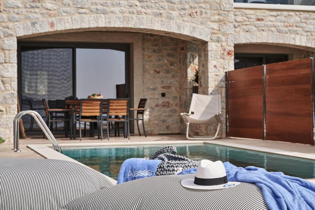 The swimming pool at or close to Beachfront Alassa Villas w Private Pools Complex