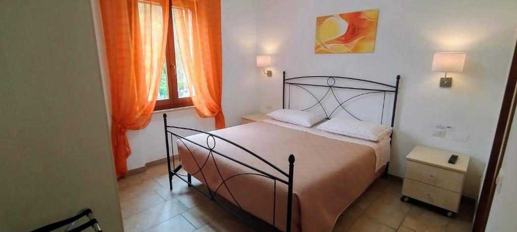 Posteľ alebo postele v izbe v ubytovaní B&B Vetralla