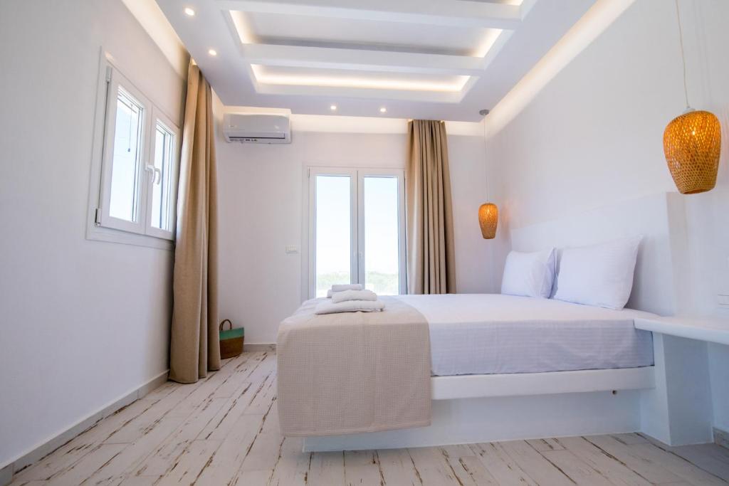 Postel nebo postele na pokoji v ubytování Depis Edem luxury villas