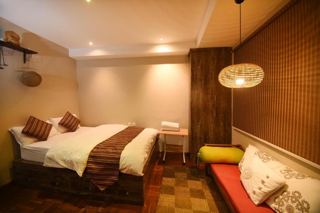 Postel nebo postele na pokoji v ubytování Mums Homestay & Studio Apartments