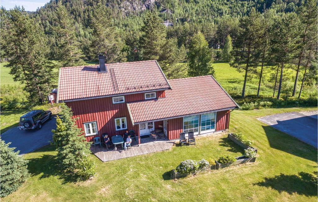 an aerial view of a red house in a field at Gaupe - Hytte 5 in Øvre Ramse