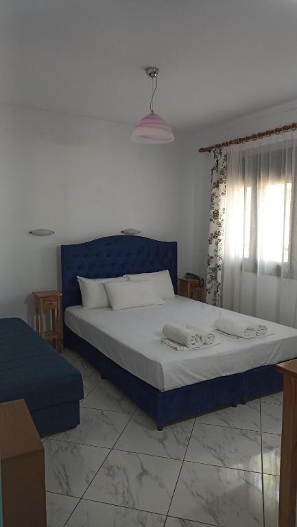 Postel nebo postele na pokoji v ubytování Villa Karapataki