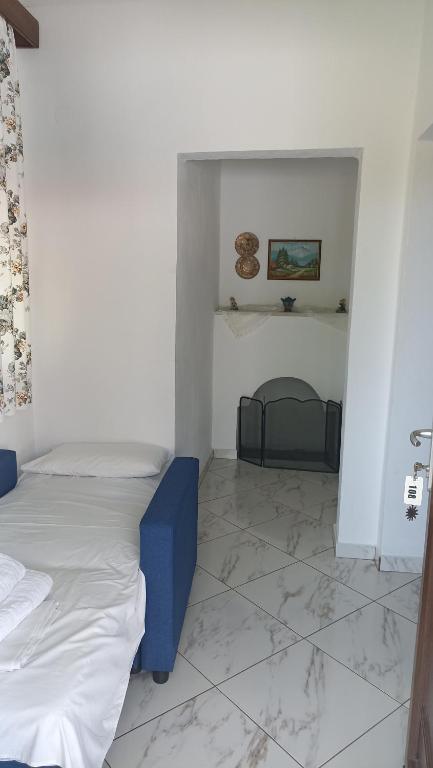 Postel nebo postele na pokoji v ubytování Villa Karapataki