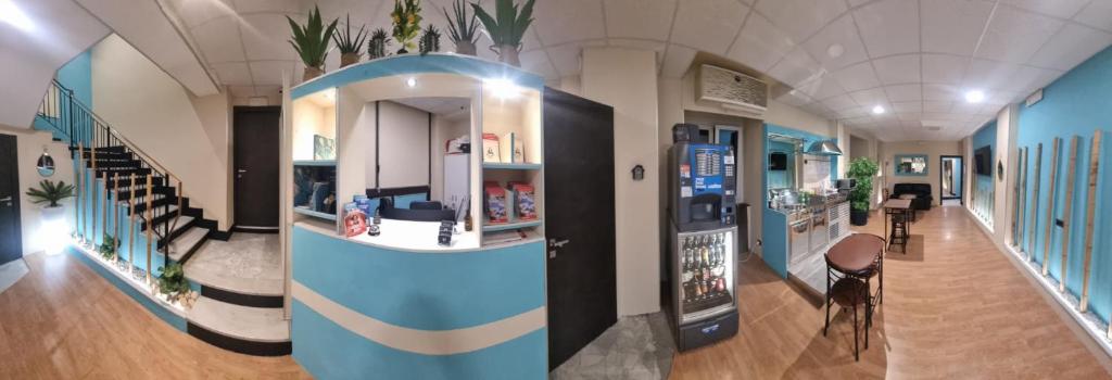 TV a/nebo společenská místnost v ubytování Mini Hotel