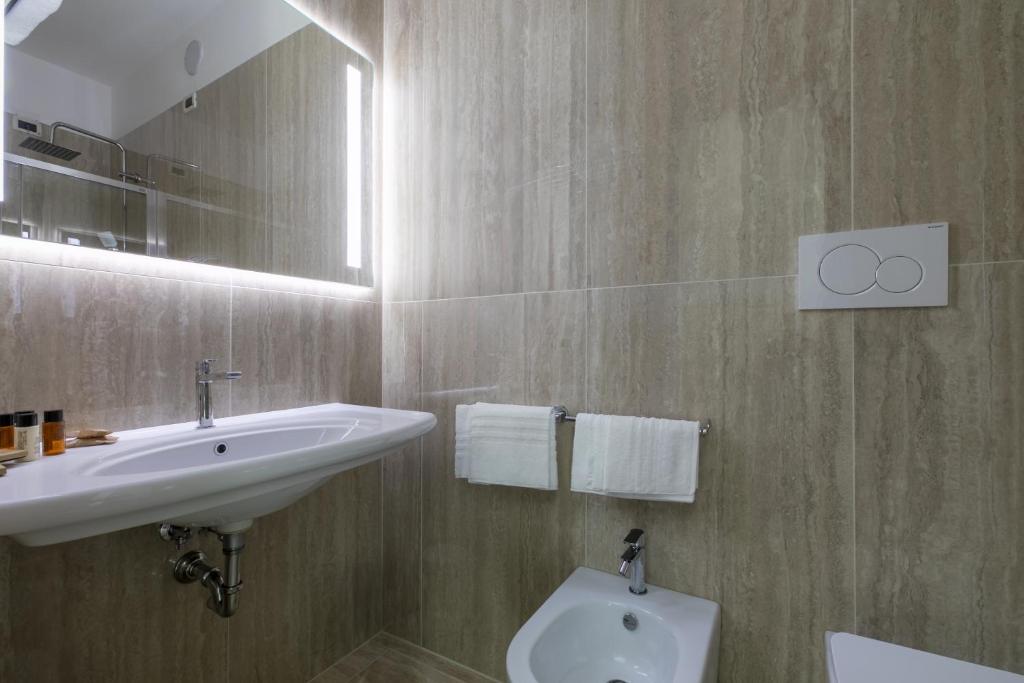 Koupelna v ubytování Hotel Gallia & Resort