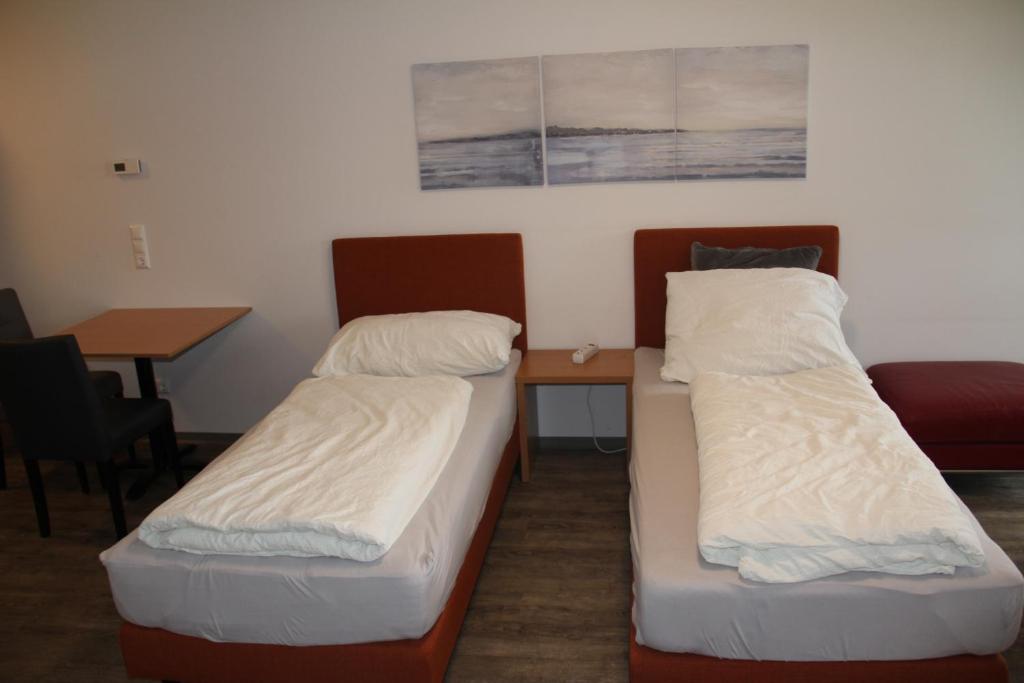 Postel nebo postele na pokoji v ubytování Workers Appartements Kreuzwirt