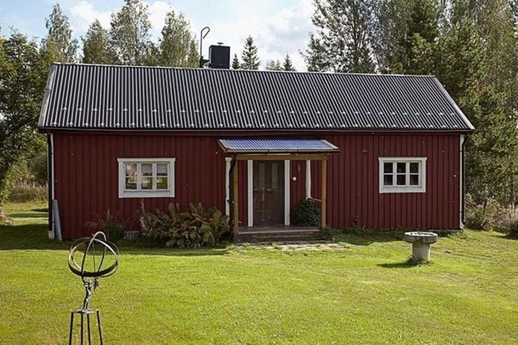 Ferienhaus am Wald mit Kaminofen und Veranda - Housity