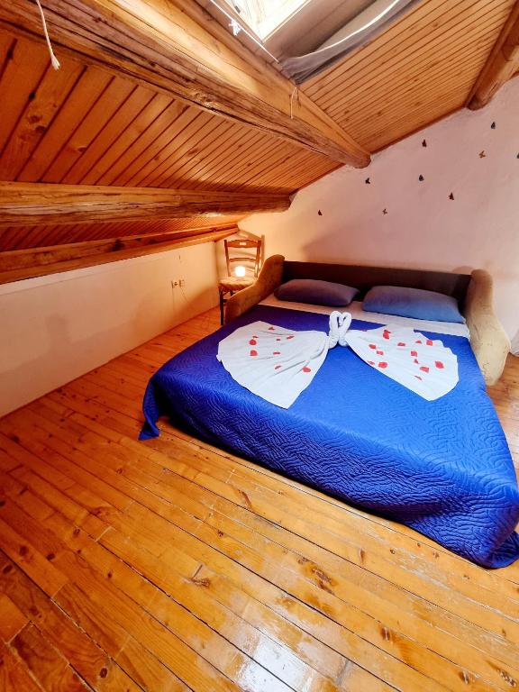 Postel nebo postele na pokoji v ubytování Apartmani Milenko Lubenice