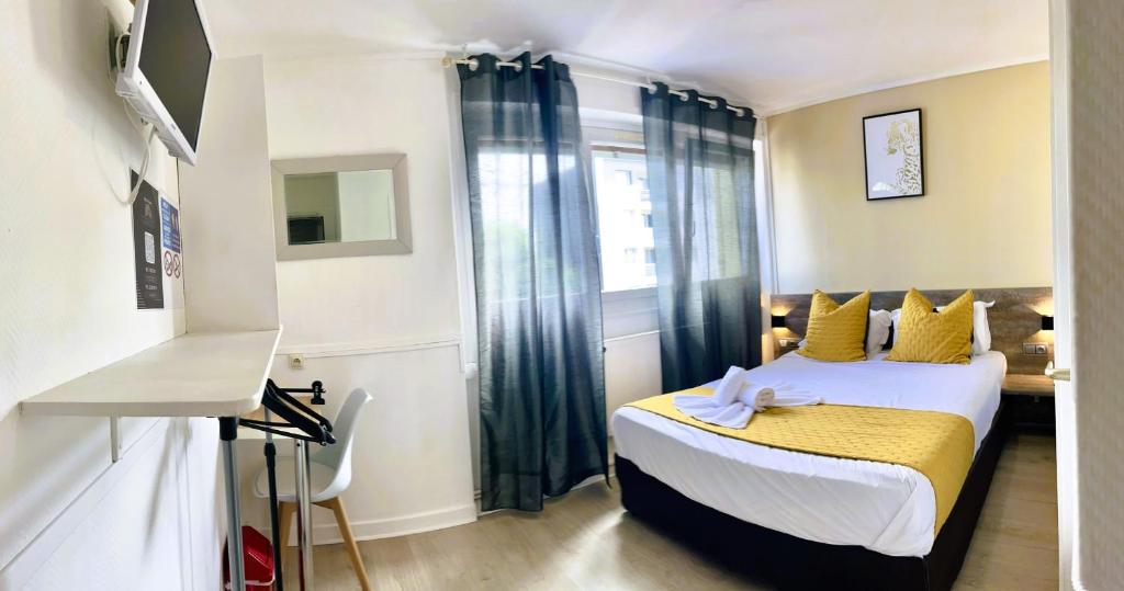 Postel nebo postele na pokoji v ubytování Hôtel OpalOriental