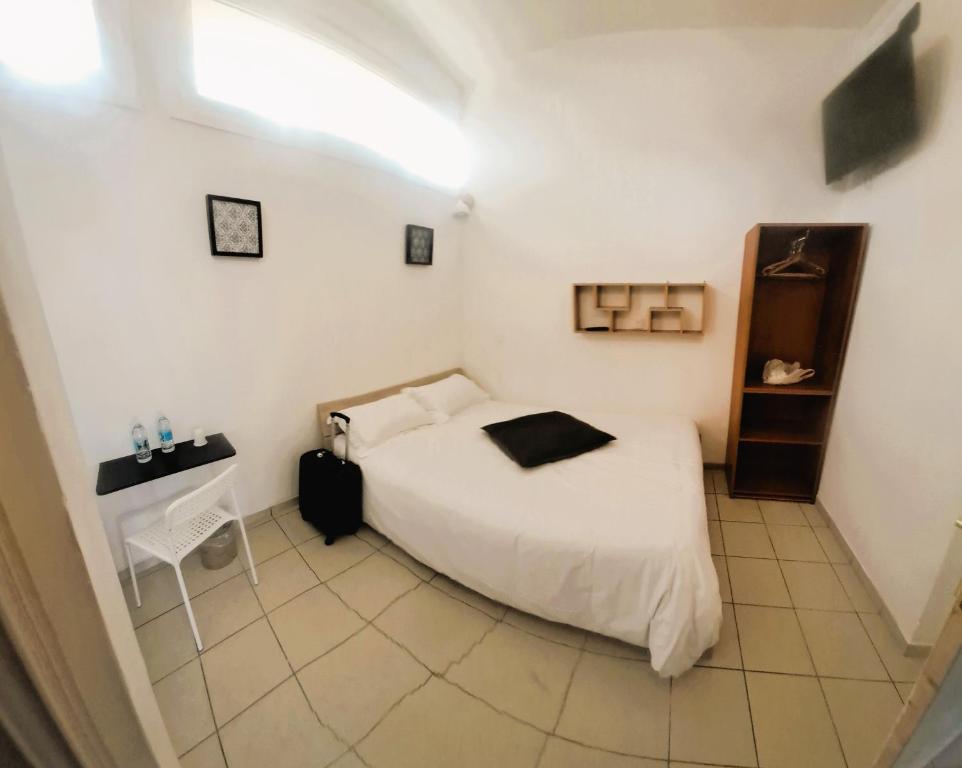 TV a/nebo společenská místnost v ubytování Hôtel OpalOriental