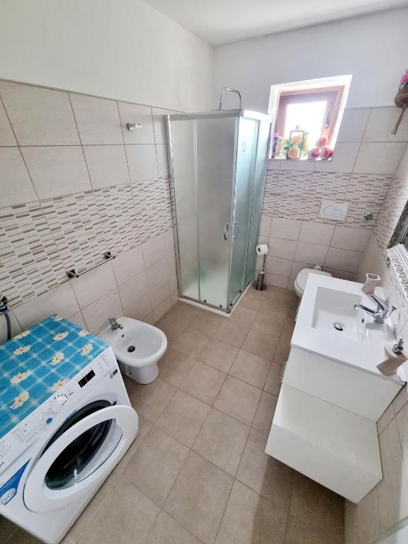 Koupelna v ubytování Apartmani Milenko Lubenice