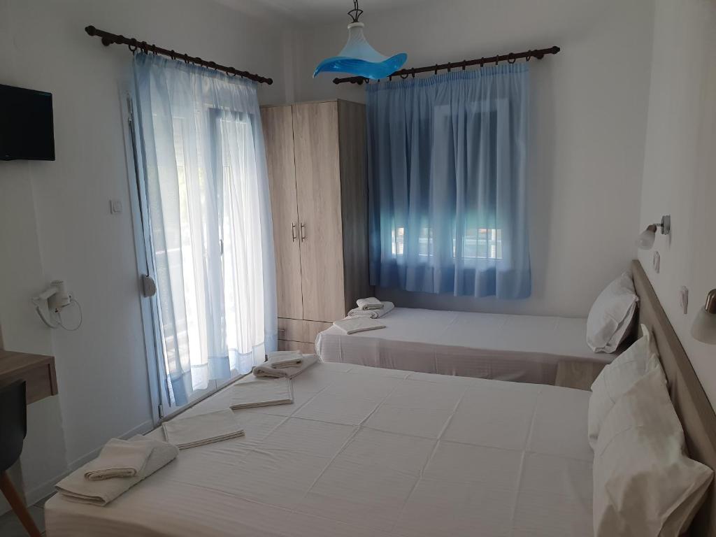 Toula's Apartments客房内的一张或多张床位