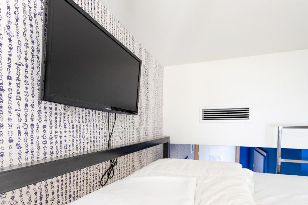 Postel nebo postele na pokoji v ubytování Hostel Link