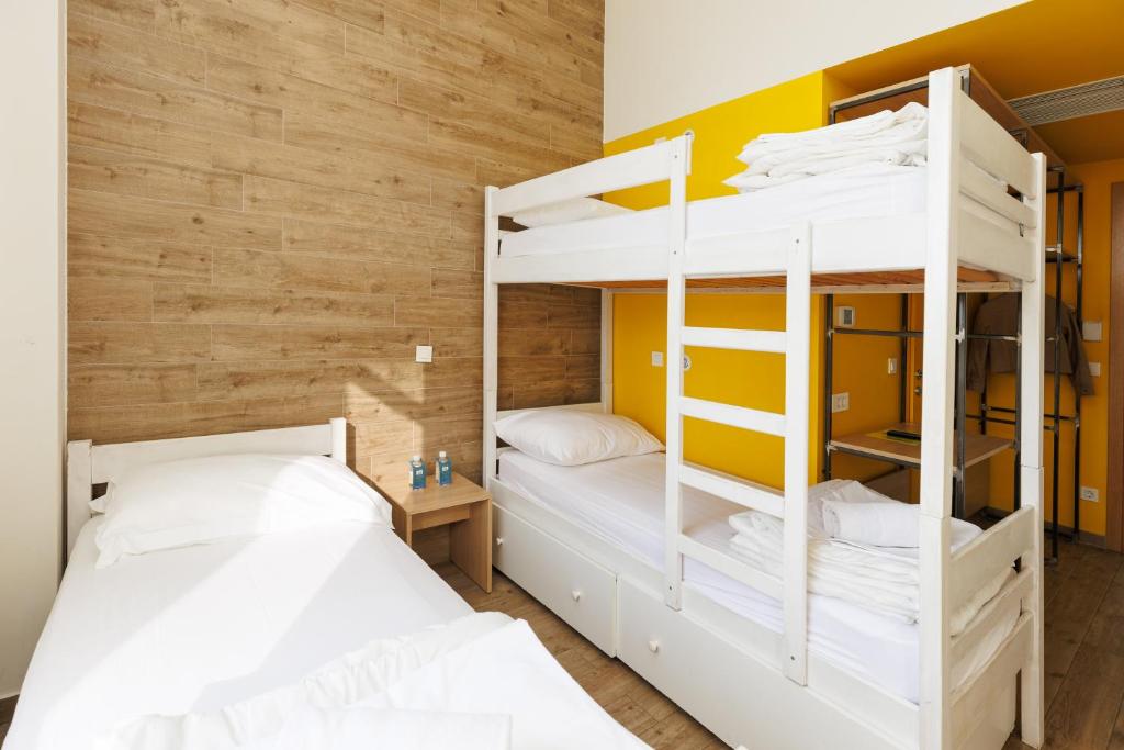 Postel nebo postele na pokoji v ubytování Hostel Link