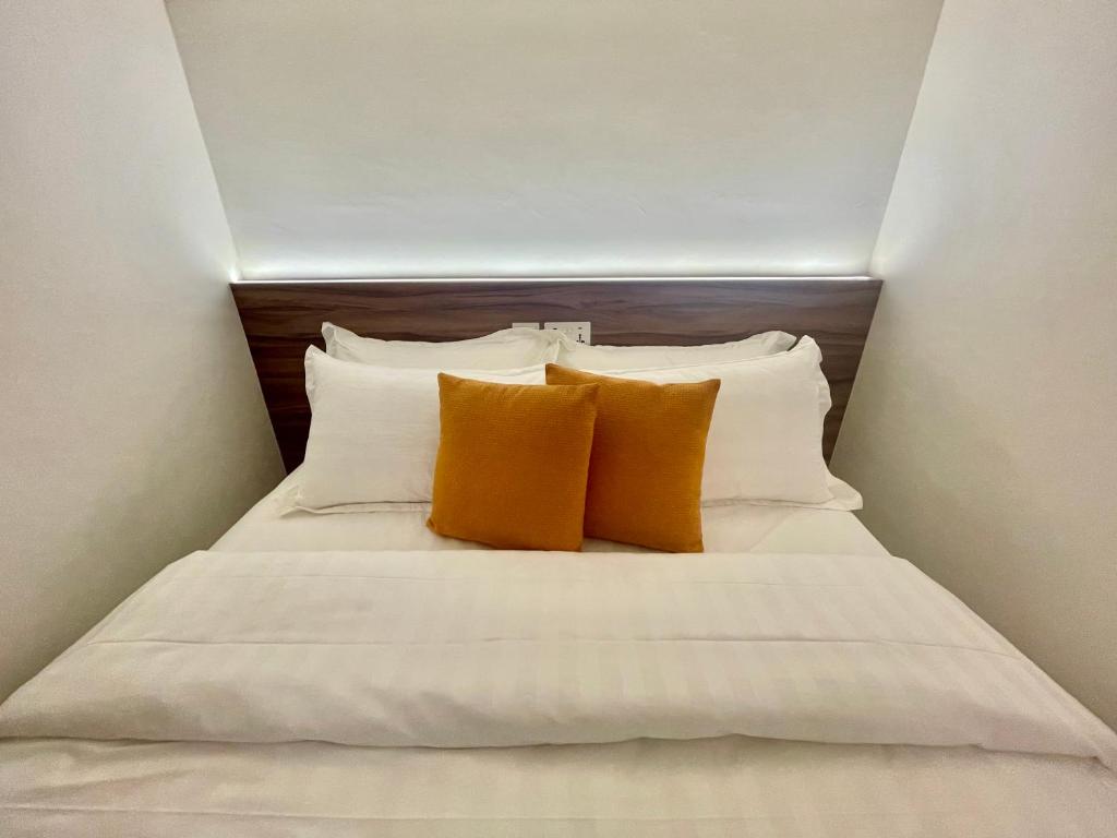 Postel nebo postele na pokoji v ubytování Faloe Hostel