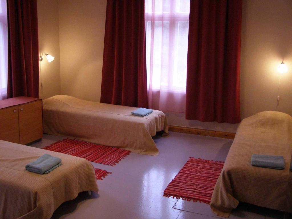 Postel nebo postele na pokoji v ubytování Tiia Guesthouse