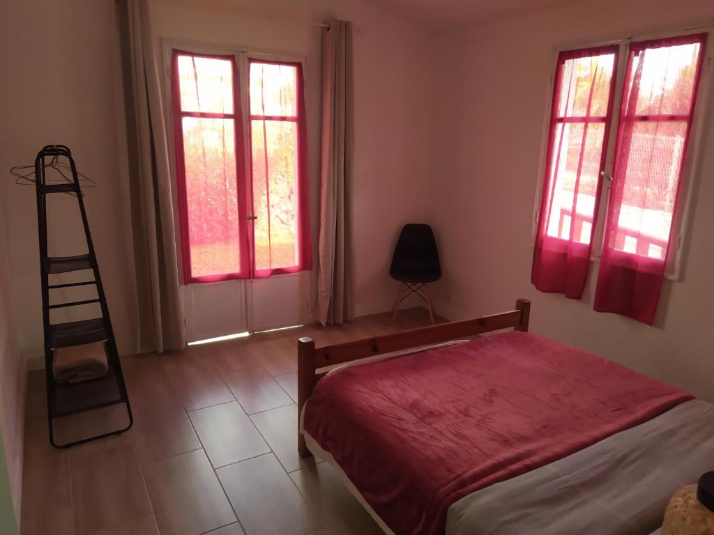 Postel nebo postele na pokoji v ubytování Gîte Timadam