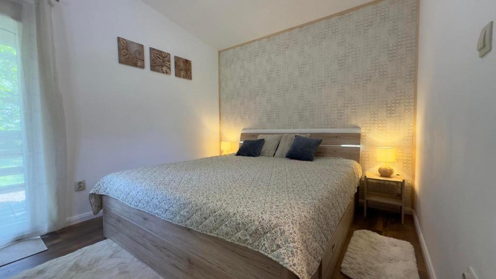 Postel nebo postele na pokoji v ubytování Szalonka Vendégház Kemence