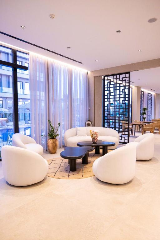Posezení v ubytování Tris3 Hotel