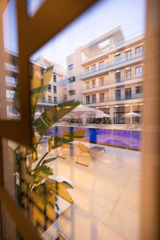 Bazén v ubytování Tris3 Hotel nebo v jeho okolí