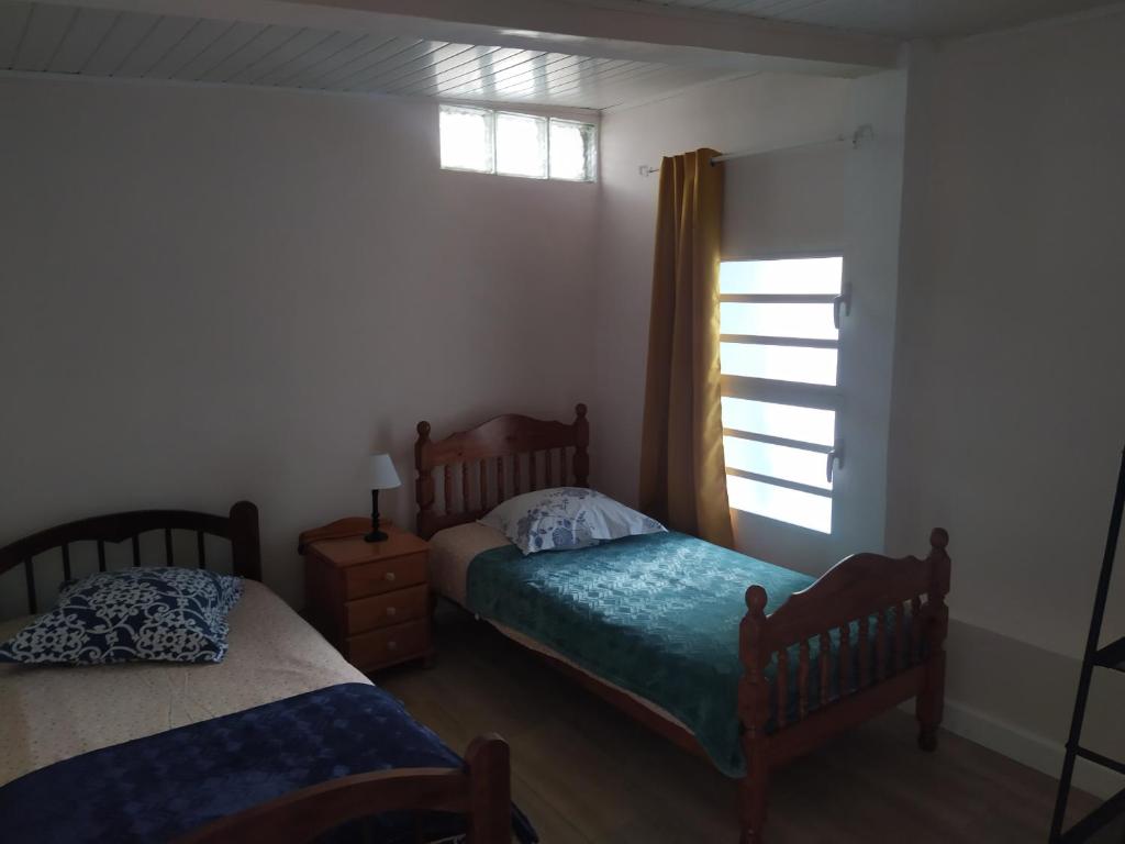 Postel nebo postele na pokoji v ubytování Gîte Timadam