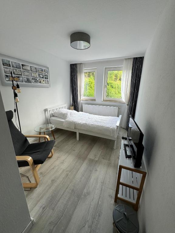 Postel nebo postele na pokoji v ubytování Hotel Zur Mühle