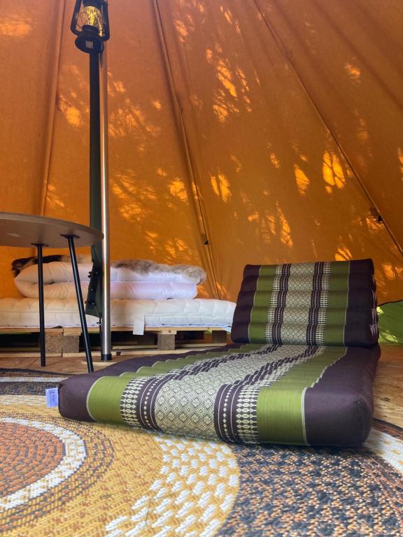 Posezení v ubytování Kleine Tipi Texel