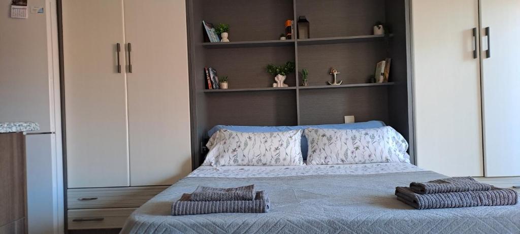 Ένα ή περισσότερα κρεβάτια σε δωμάτιο στο APART HOTEL