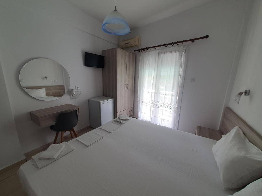 Toula's Apartments客房内的一张或多张床位