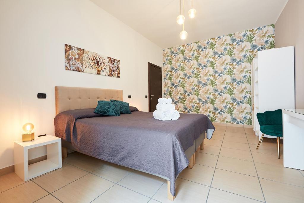 Letto o letti in una camera di Vicky's Luxury Guesthouse by NapoliApartments