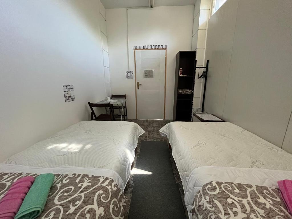 Postel nebo postele na pokoji v ubytování Rooms Asceric