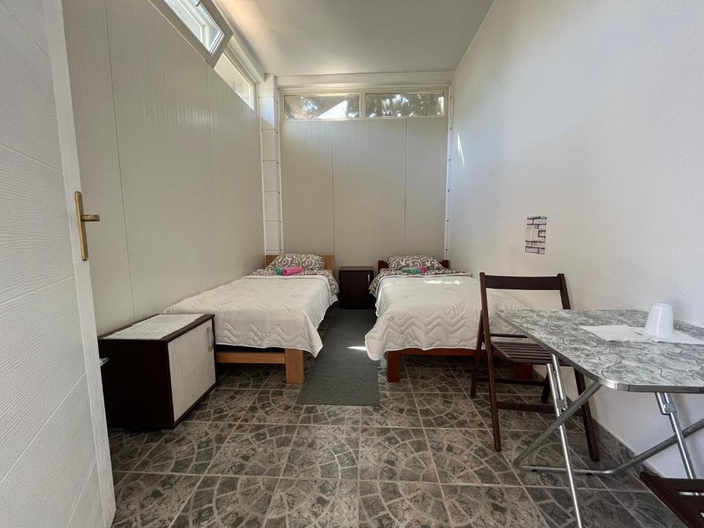 Postel nebo postele na pokoji v ubytování Rooms Asceric