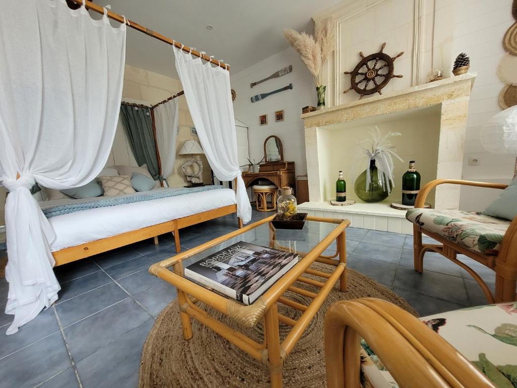Ένα ή περισσότερα κρεβάτια σε δωμάτιο στο Chambre Océan Cosy Bordeaux Saint Emilion