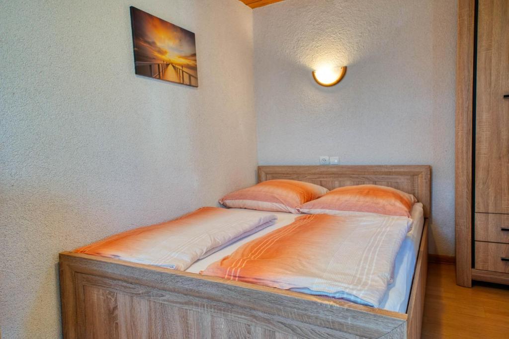 Postel nebo postele na pokoji v ubytování Kwatery u Zdzicha