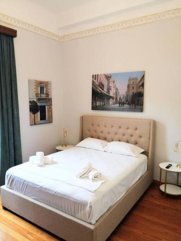 Posteľ alebo postele v izbe v ubytovaní Elegant apartment under the Acropolis