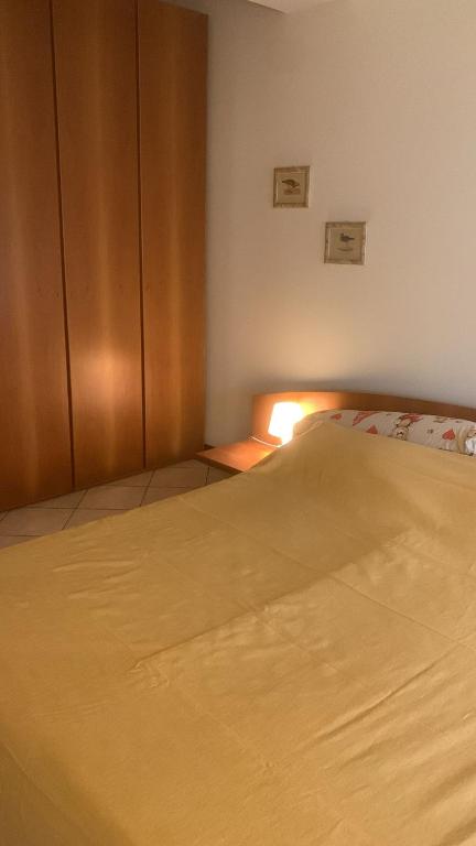 Postel nebo postele na pokoji v ubytování Hotel Rosati