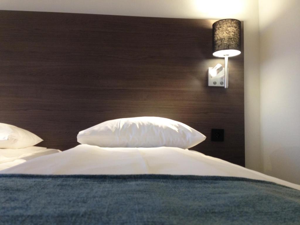 Postel nebo postele na pokoji v ubytování Thon Partner Hotel Andrikken