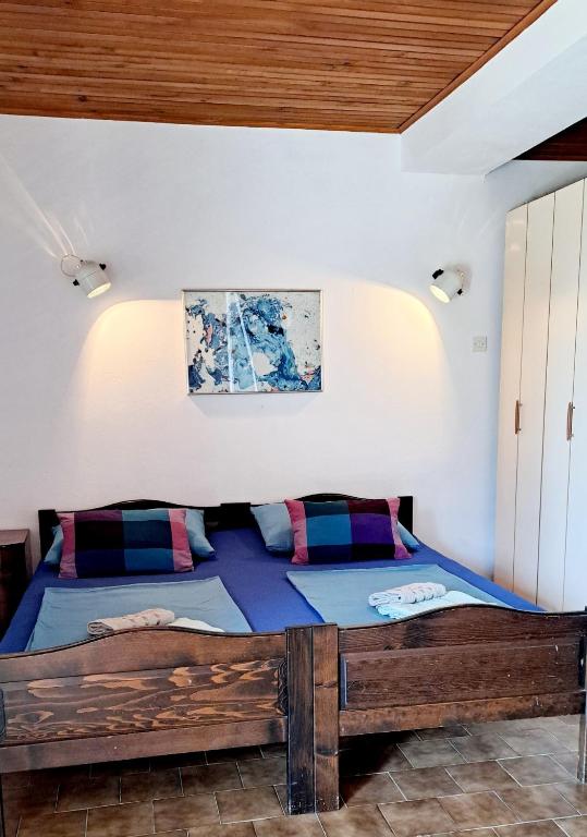 Posteľ alebo postele v izbe v ubytovaní Apartmani E&G