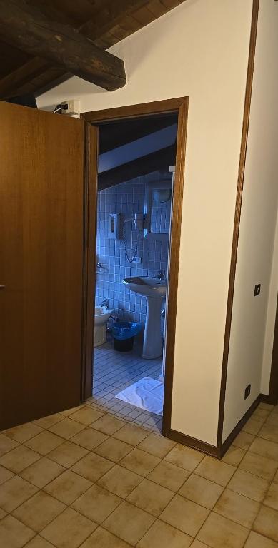 Koupelna v ubytování Albergo Al Gambero