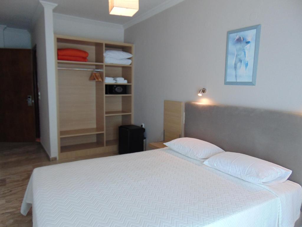 Postel nebo postele na pokoji v ubytování Polyxeni Hotel
